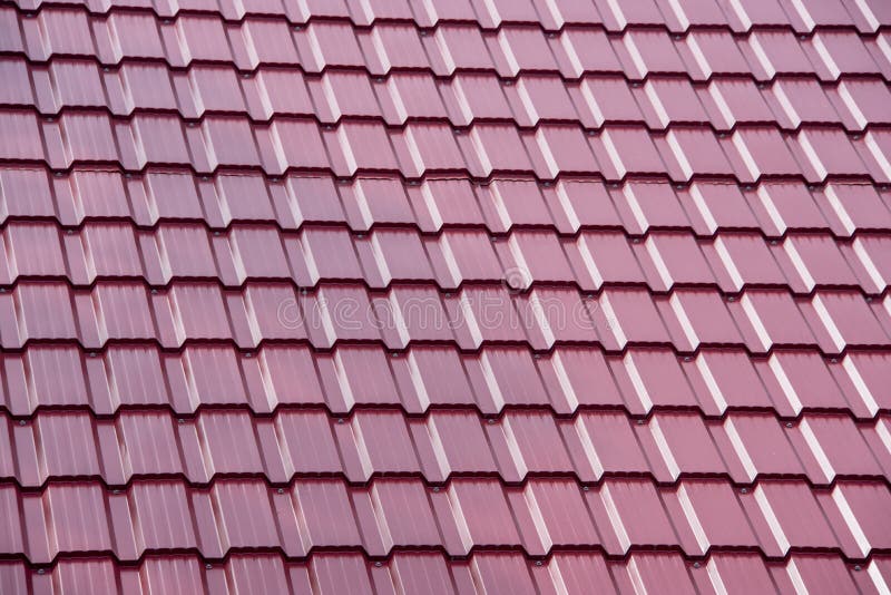 Close-up of red metal roof of a house royalty free stock images