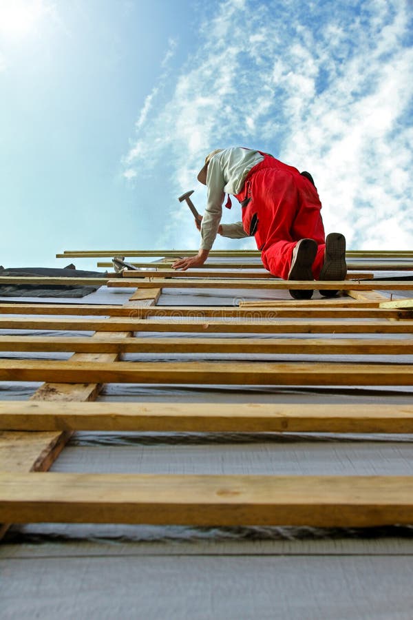 Construction worker on the roof stock photography