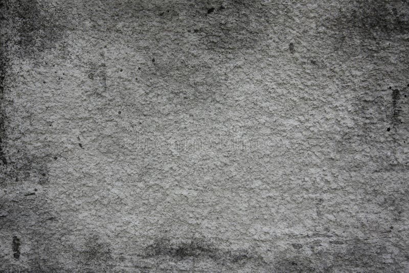Grey stucco. Textured background with burnt edges stock photo