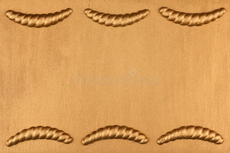 Gypsum cornice, stucco, moldings, friezes on a gold background, copy space. Top view stock photos