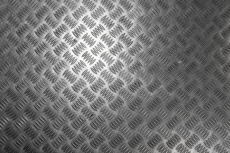 Metal diamond pattern non-skid gray wrap around texture seamless tile. Pattern style of steel floor for background stock photos