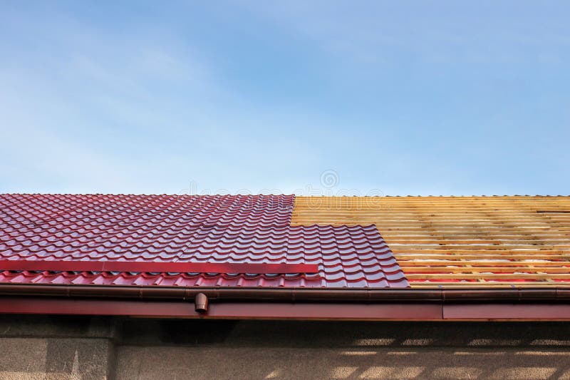 Roof roofing, repair, replacement of metal tiles stock photos