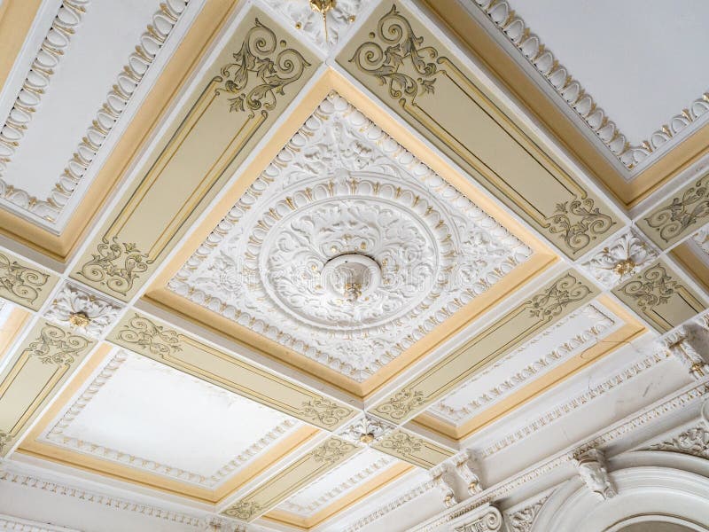 Stucco ceiling and wall. Molding, cornice. Old plaster architectural elements of the interior.  royalty free stock images