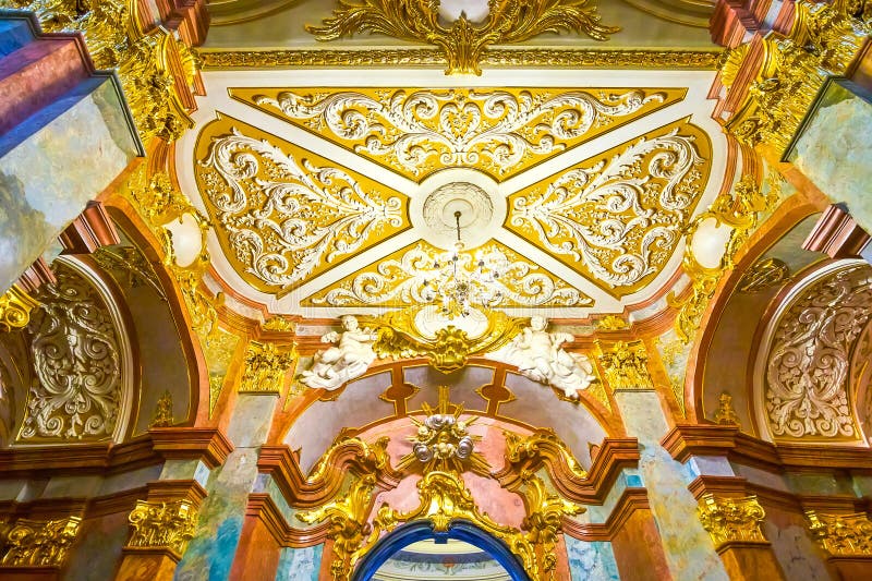 The stucco moldings on the ceilings of Jasna Gora Basilica in Czestochowa, Poland. CZESTOCHOWA, POLAND - JUNE 12, 2018: Splendid stucco moldings decorations on royalty free stock photography