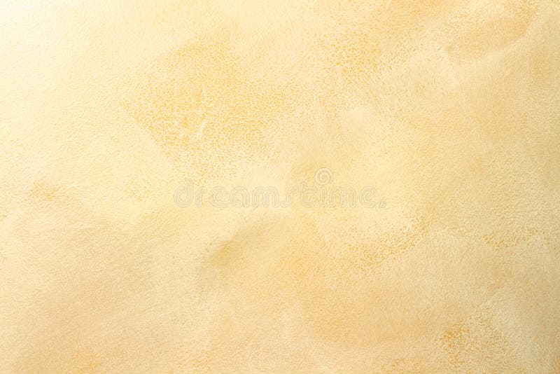 Stucco Wall Background. Macro of stucco wall with soft warm tones royalty free stock image