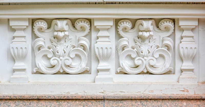 Vintage antique architectural stucco molding decoration, buildings wall texture. Vintage architectural stucco molding decorations of buildings wall texture. Old royalty free stock photography